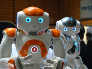NAO robots from Aldebaran apparently developing jealousy: the orange robot had been attracting too much praise for recognizing and naming the animal pictures shown on flash cards – albeit presented slowly